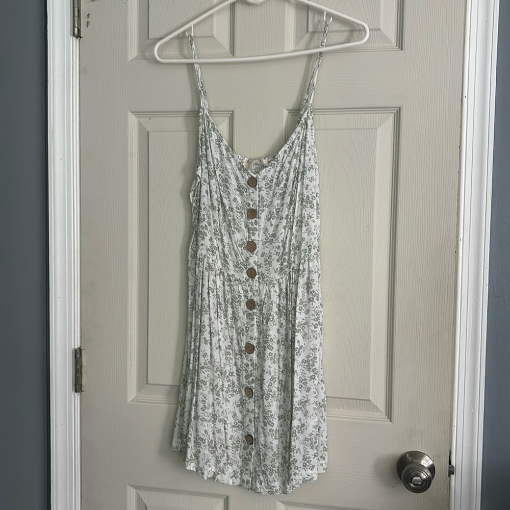 I bought this dress however I since lost weight. It’s brand new with the tags!